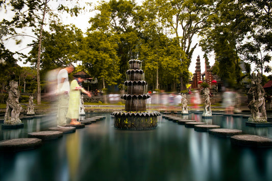 people in park near water fountain during daytime