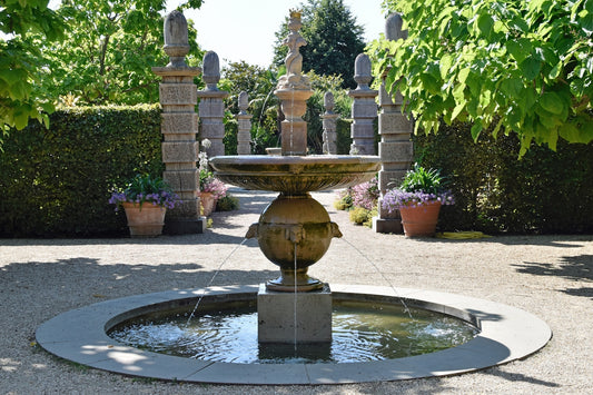 a fountain in a garden