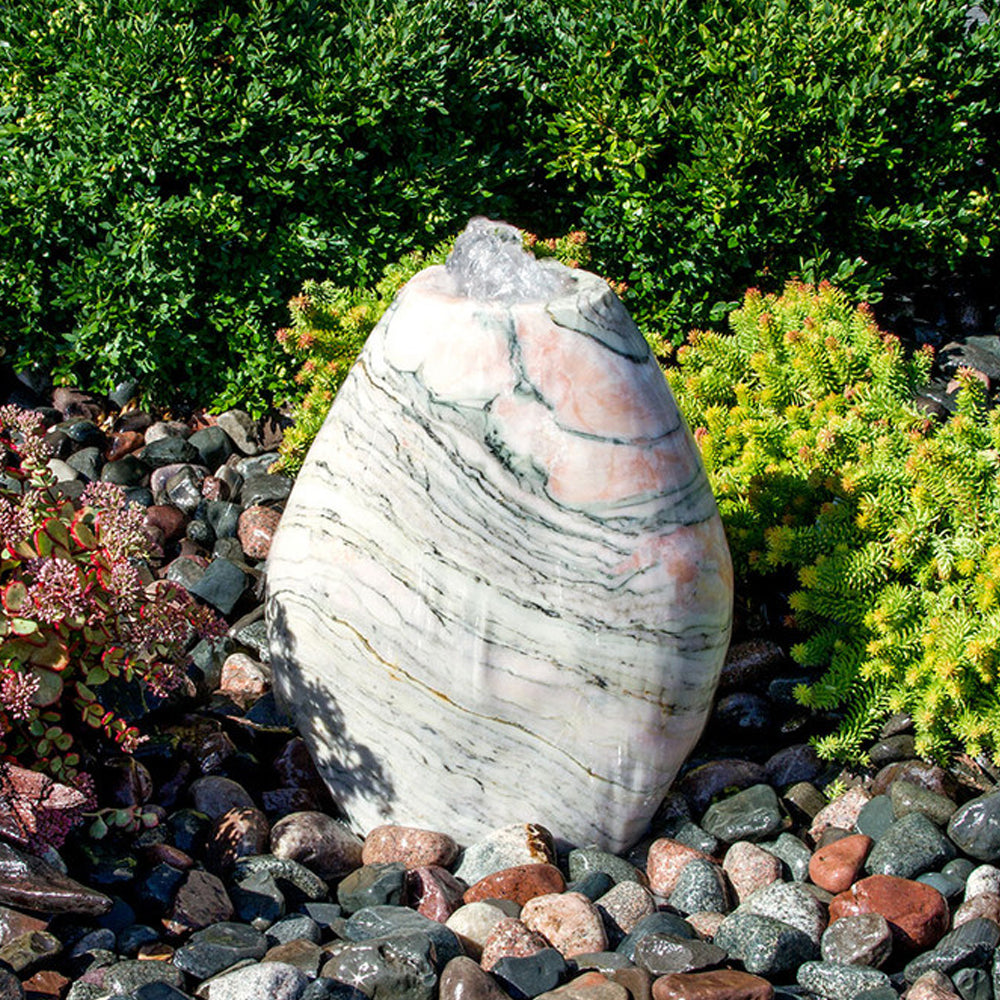 Almond shaped pink marble stone fountain