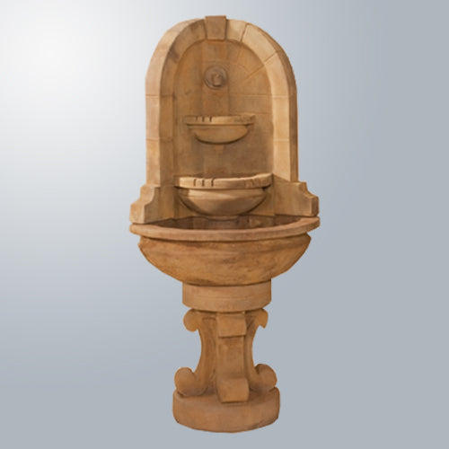Montefalco Corner Fountain with Concrete Water Spout in a garden setting