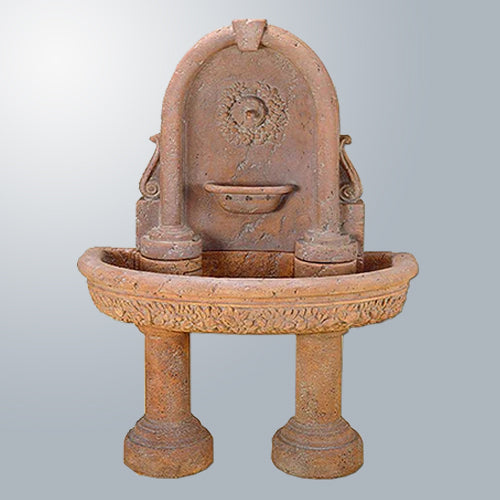 Robbiana Wall Outdoor Fountain with 2 Pedestals in a garden setting