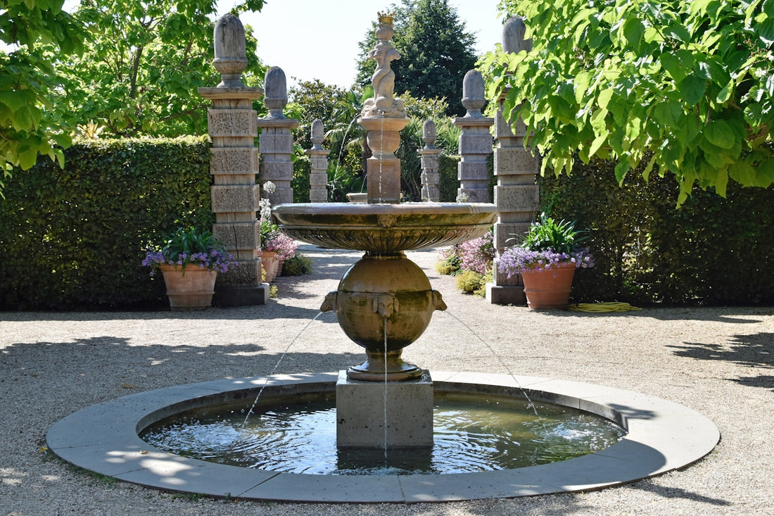 a fountain in a garden