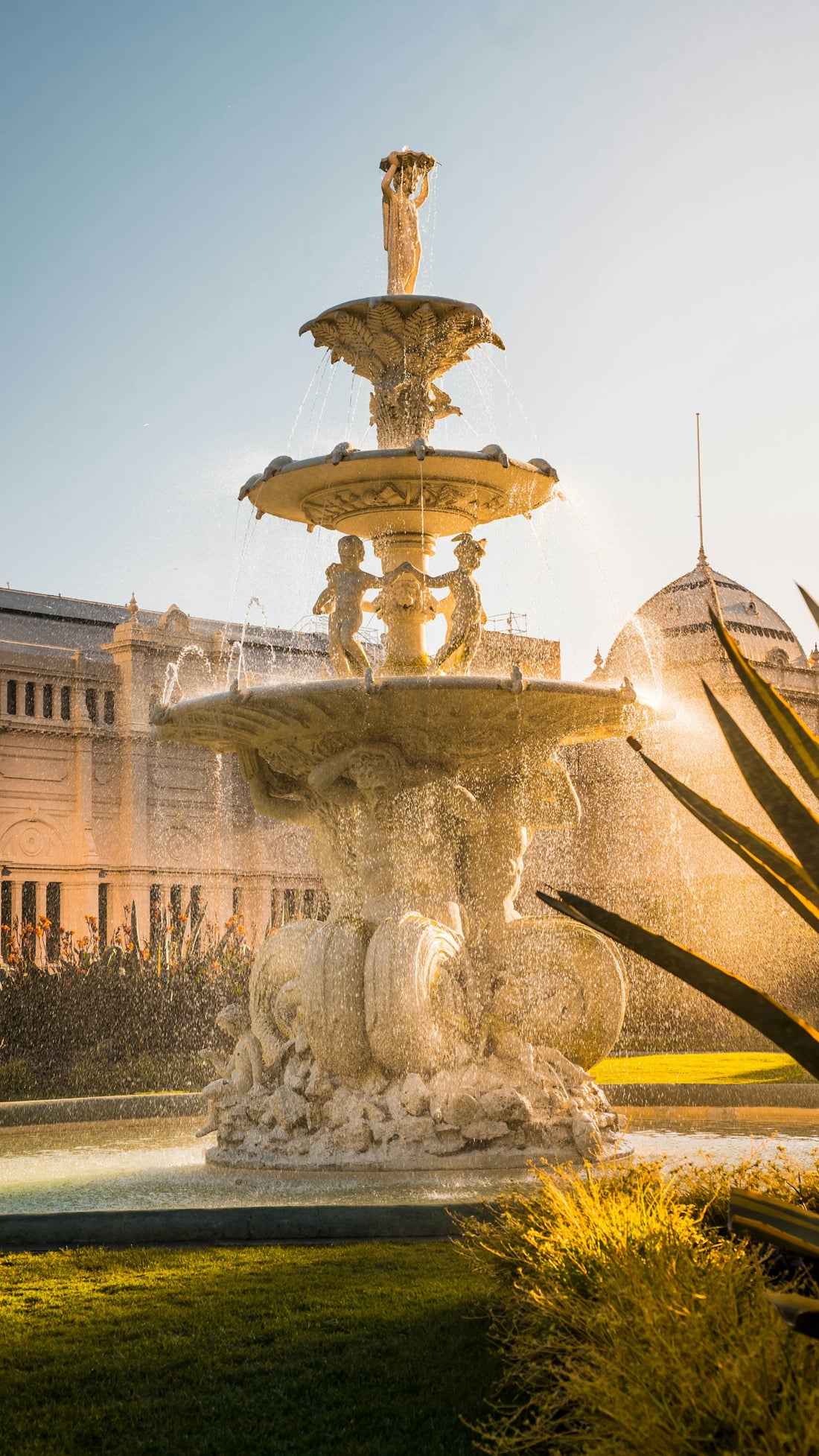 a fountain with a statue on top