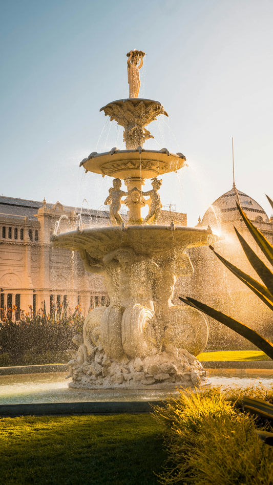 a fountain with a statue on top
