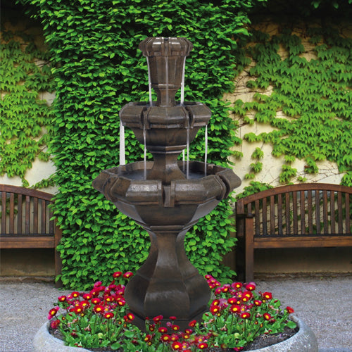 Kensington Two Tier Fountain in a garden setting
