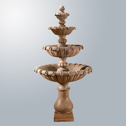 Grand Chateau Four Tier Fountain in a garden setting