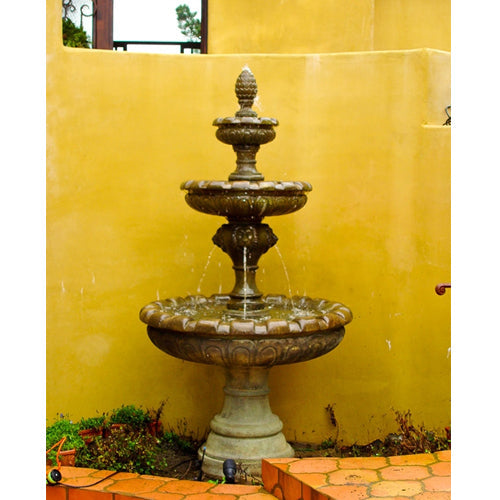 Monegasque Lion Three Tier Fountain in a garden setting