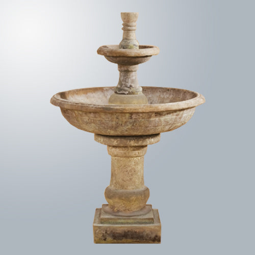 Pavana Two Tier Fountain in a garden setting