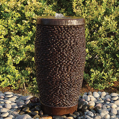 Shimmering Stones Pondless Fountain with water flowing over natural rocks