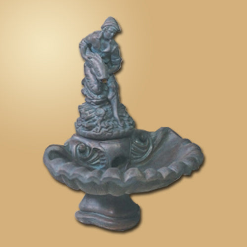 Small One Tier Fountain With Fisher Boy statue in a garden setting