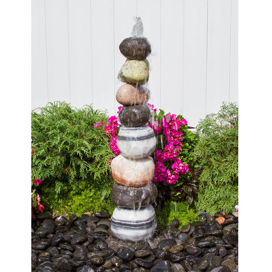 Stacked Pebble Garden Fountain with water flowing