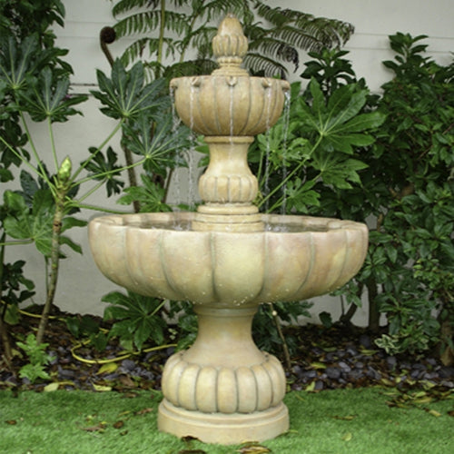 Urbino Grande Short Two Tier Fountain in a garden setting