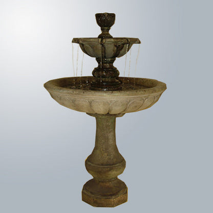 Vicentina Two Tier Fountain in a garden setting