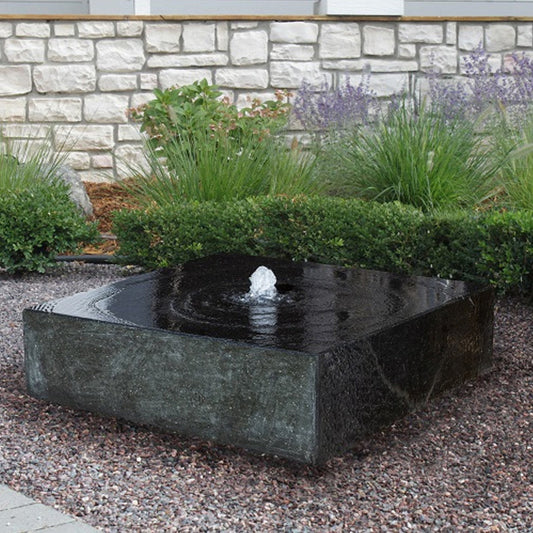 Yoshida Square Stone Fountain with water flowing